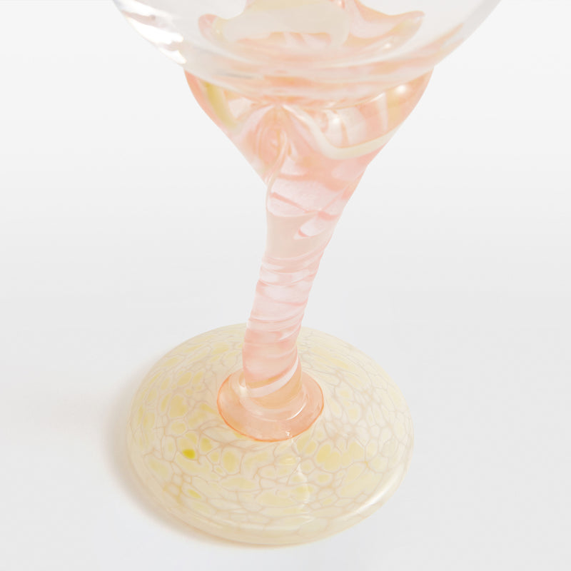 A Pair of Two Pink and White Swirl Wine Glasses