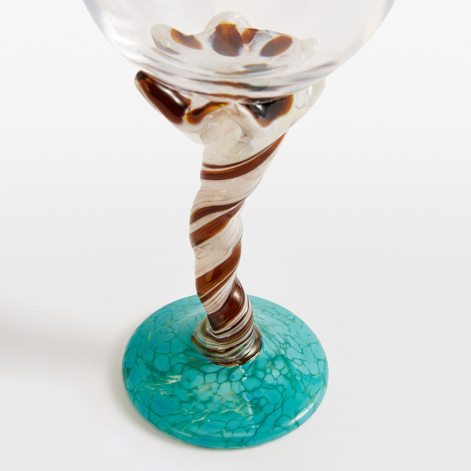 A Pair of Two Turquoise and White Swirl Wine Glasses