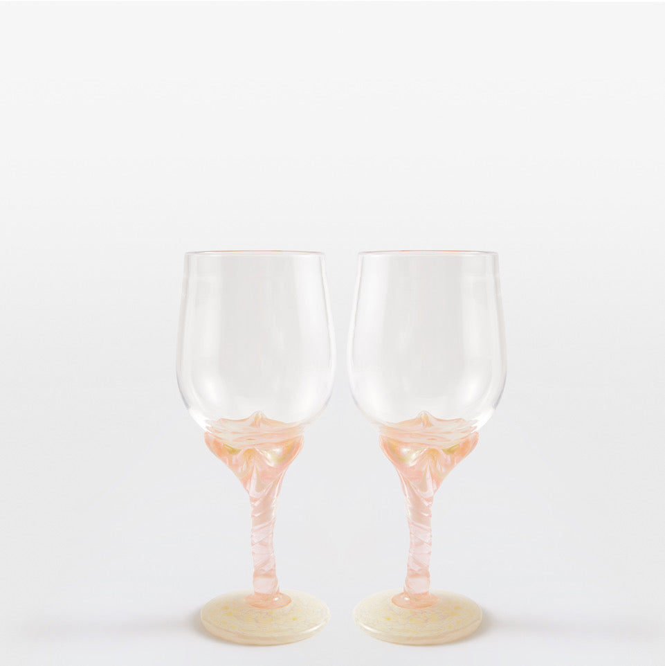 A Pair of Two Pink and White Swirl Wine Glasses